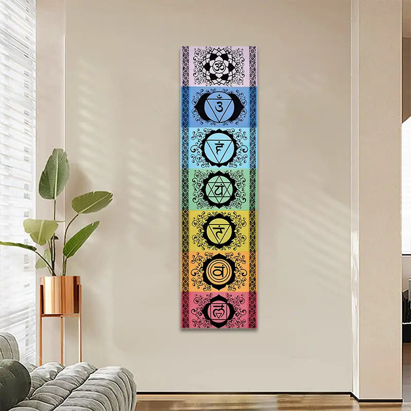 Chakra tapestry with seven vibrant symbols displayed on a wall, complementing a modern home decor