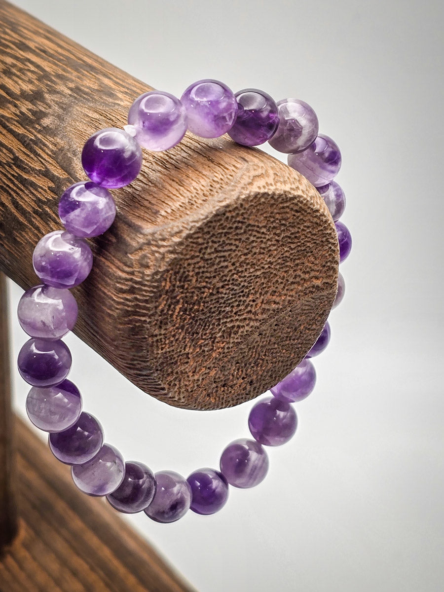 Amethyst bracelet displayed for an overview shot, showcasing its beauty when worn alone or stacked.