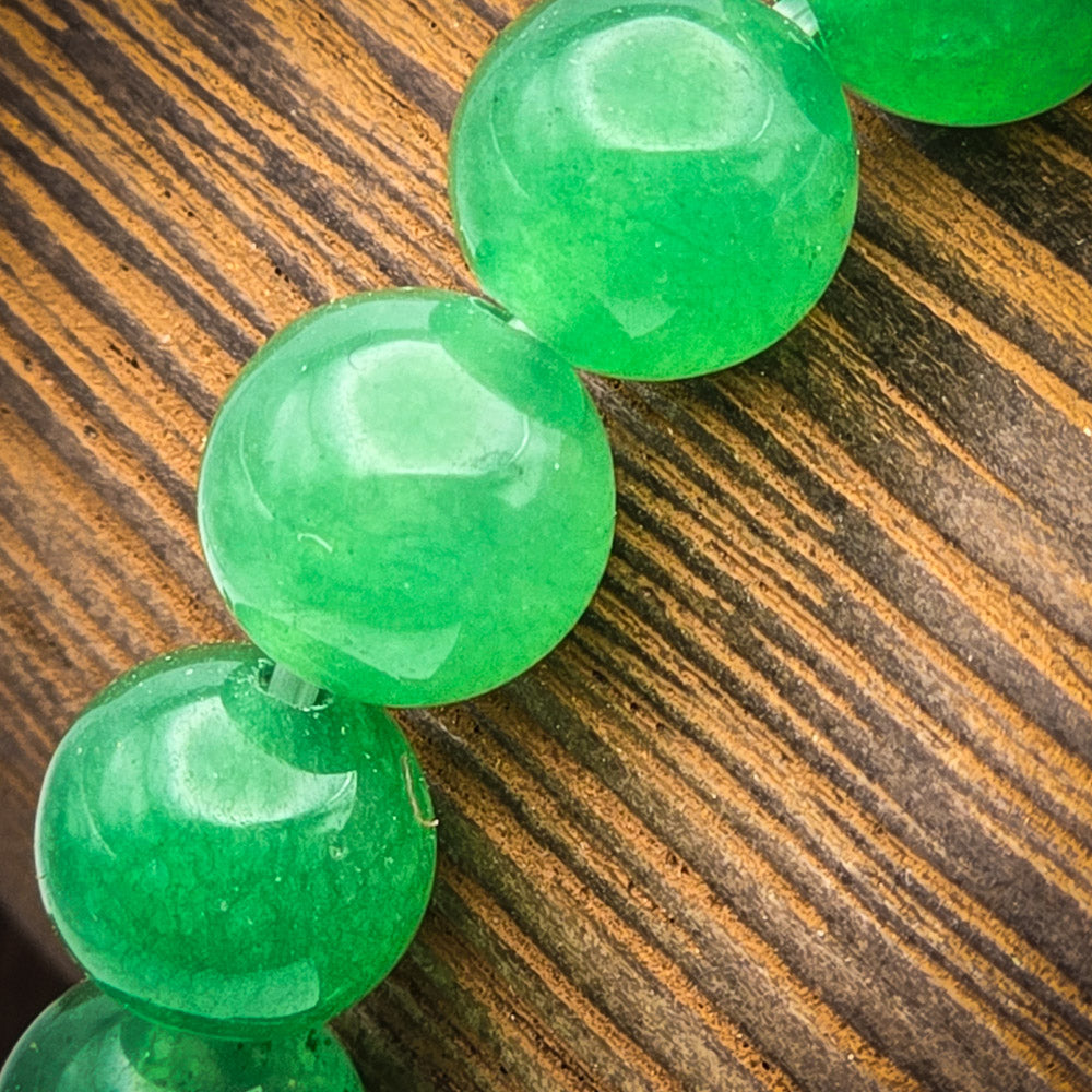 Detail of Green Aventurine Beads - Activating Heart Chakra for Emotional Well-Being.