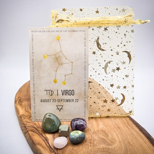 Virgo Zodiac Harmony Stone Bag with Birthstone and Guide Card, all contents removed from bag on a wood panel, white background