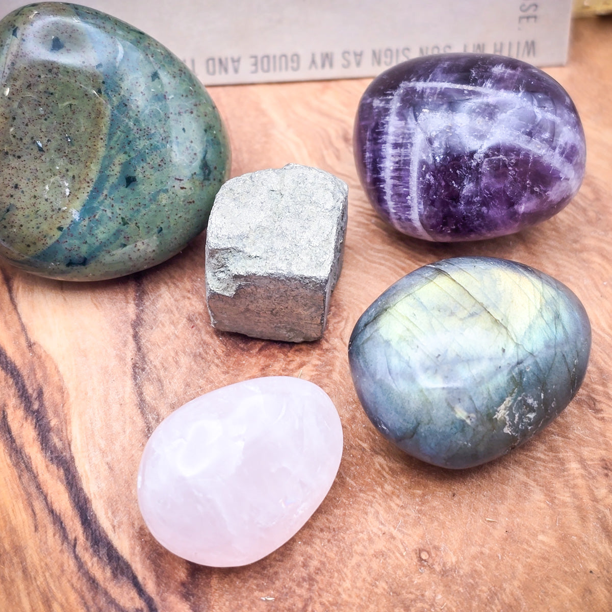 Moss Agate birthstone alongside Pyrite, Rose Quartz, Labradorite, and Amethyst for Virgo