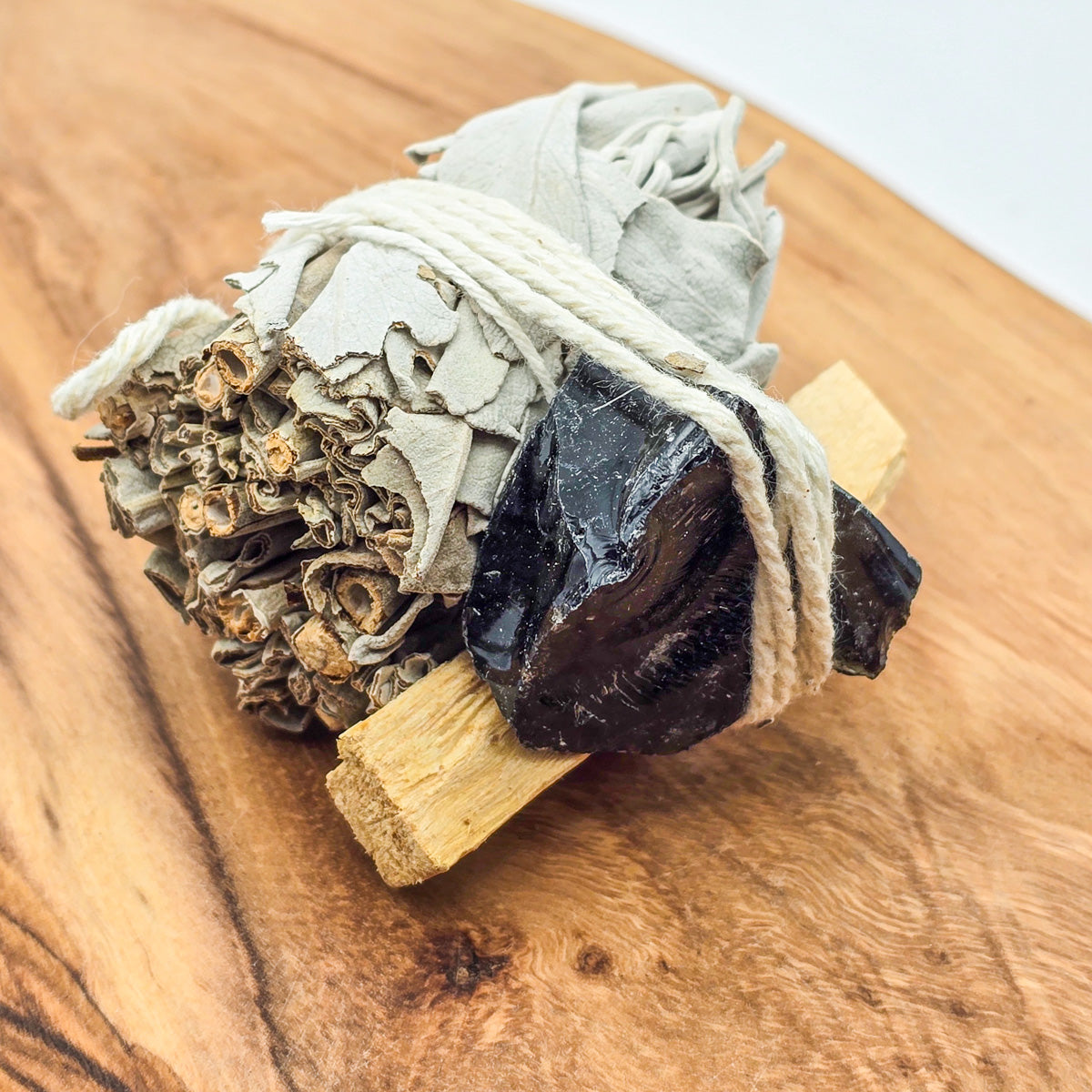 Mini Cleansing Trio on wood with Obsidian from the left - protective aura