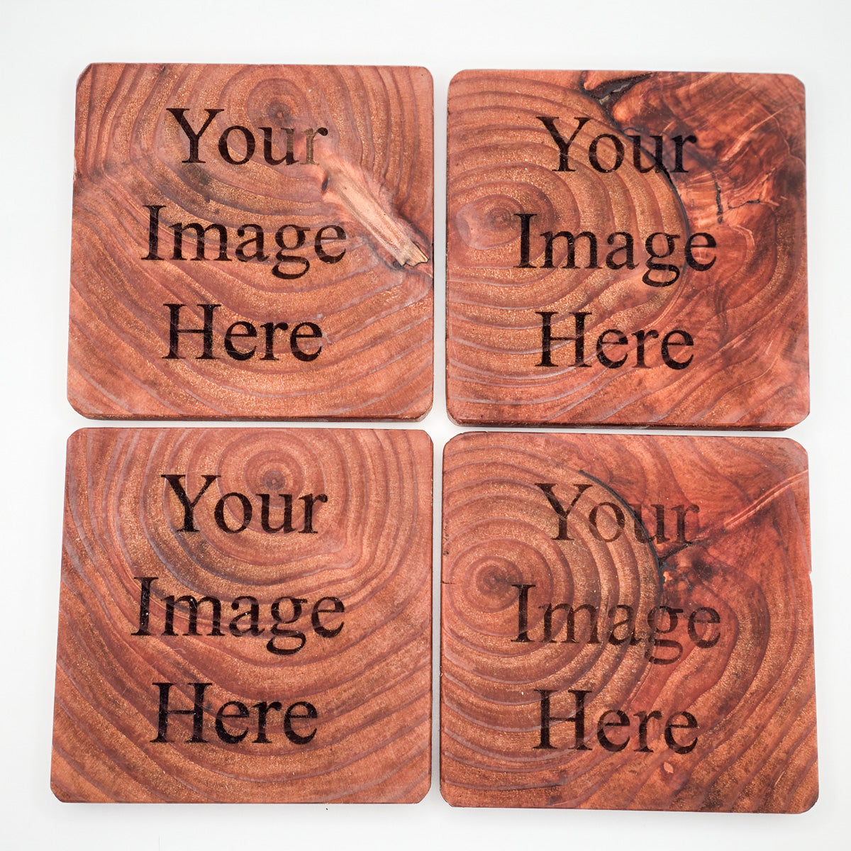 Customizable set of four Redwood Coasters, ready for personal designs.